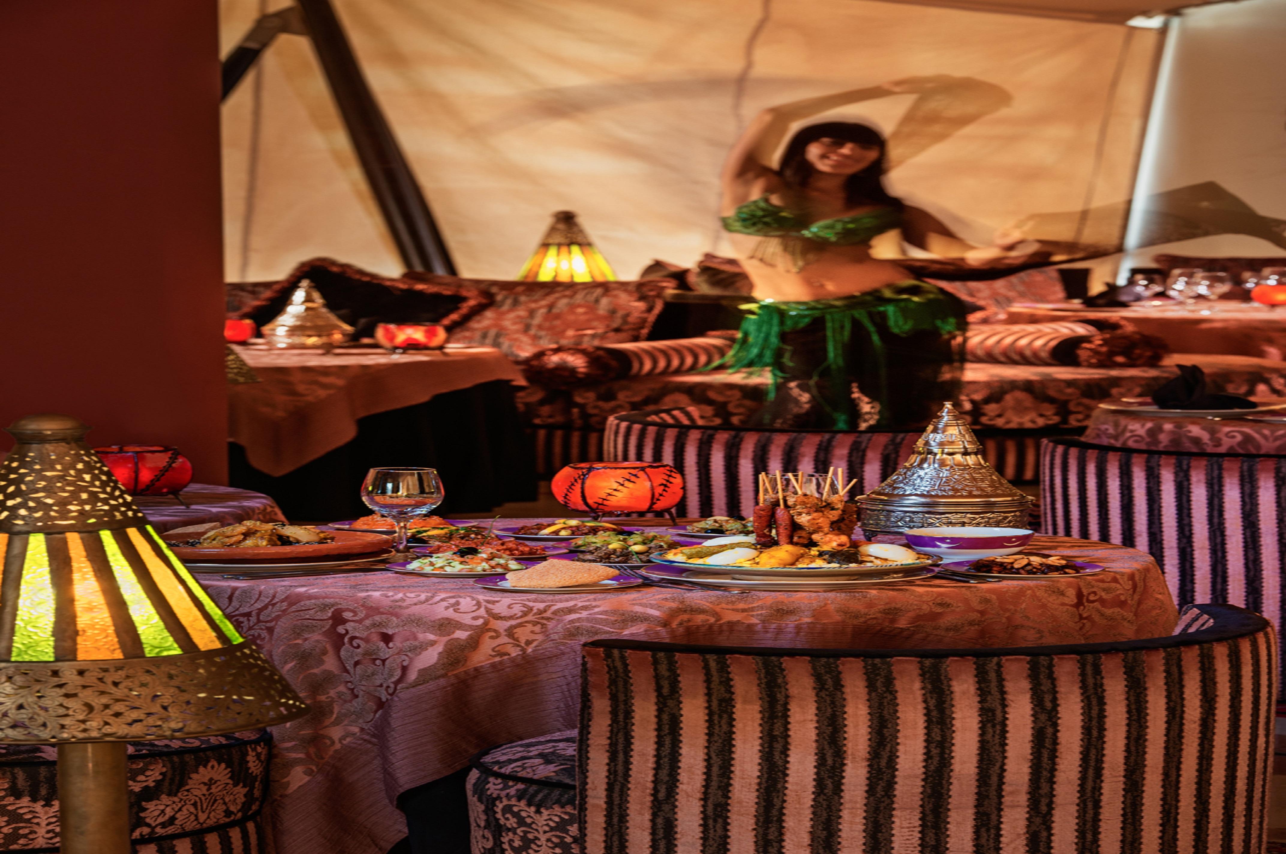 Moevenpick Hotel & Casino Malabata Tanger מראה חיצוני תמונה A belly dancer in a restaurant in Cairo
